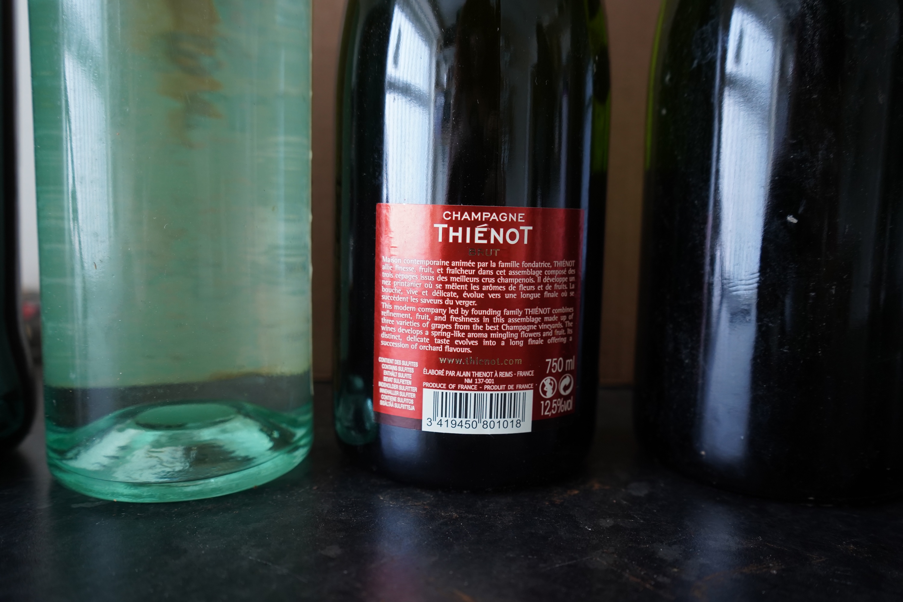 Eight bottles of champagne, port and rum to include Mumm, Laurent Perrier and Warres